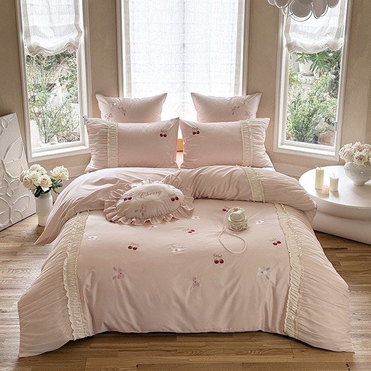 Luxurious satin bedding set with gathered ruffle, cherry embroidery and decorative pillow