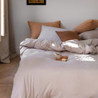 Minimalistic duvet cover set made of skin-friendly cotton blend with soft fiber filling