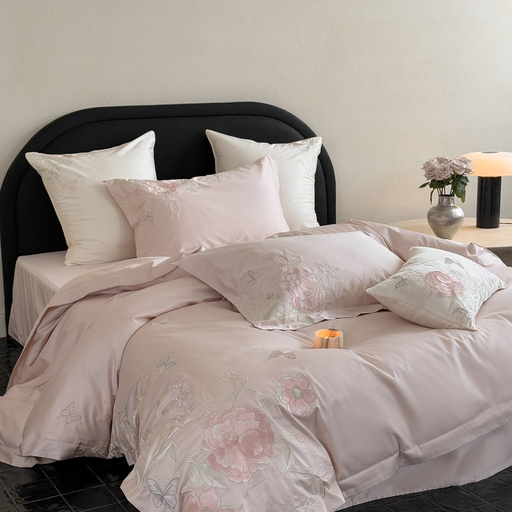 Luxurious satin bedding set with floral embroidery and silk-soft finish Bowlift