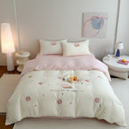 Cotton bedding set with embroidered donut motif and pillowcases Bowlift
