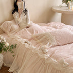Romantic bedding set with ruffles and lace trim