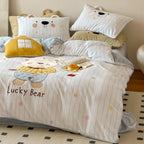 Children's bedding set with three-dimensional ear appliqué and embroidered bear motif