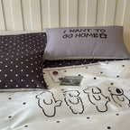 Reversible bedding set made of cotton blend with polka dot pattern and minimalist animal illustration