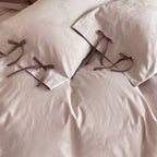 Elegant cotton satin bedding set with reversible function and ties