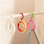Plastic ring holder for hats and bags