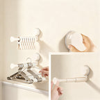 Telescopic clothes rail with suction cup