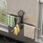 Suction cup holder for kitchen towels, rotatable